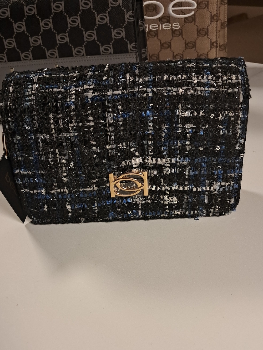 bebe Tweed Clutch in Black, Blue and White with Gold Hardware